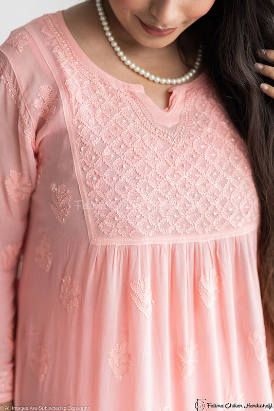 PEACH IQRA VISCOSE CHIKANKARI PEPLUM TOP