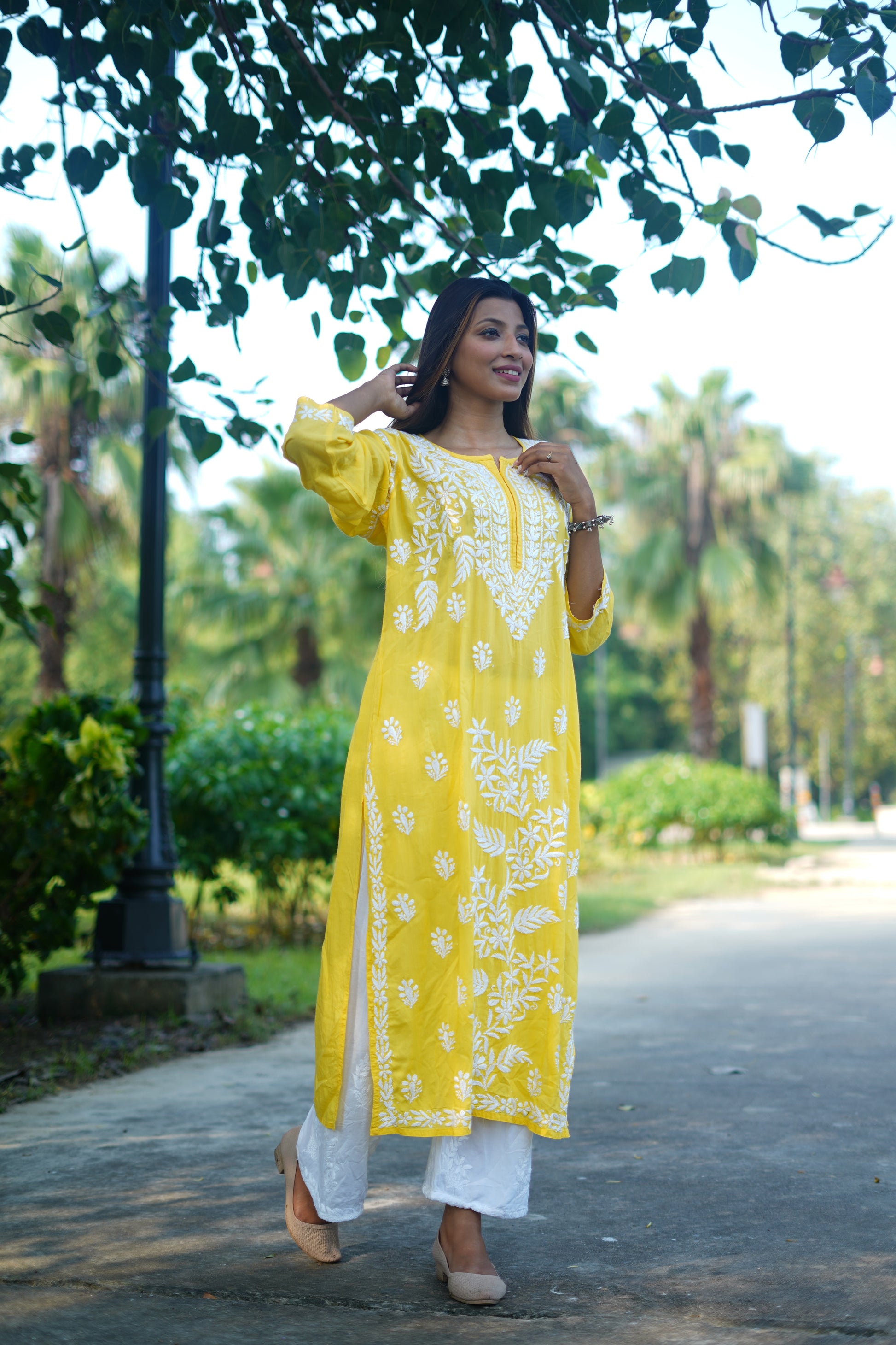 HIMANSHI YELLOW MODAL  CHIKANKARI KURTI