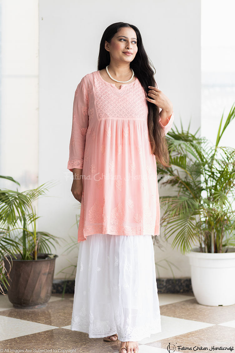 PEACH IQRA VISCOSE CHIKANKARI PEPLUM TOP
