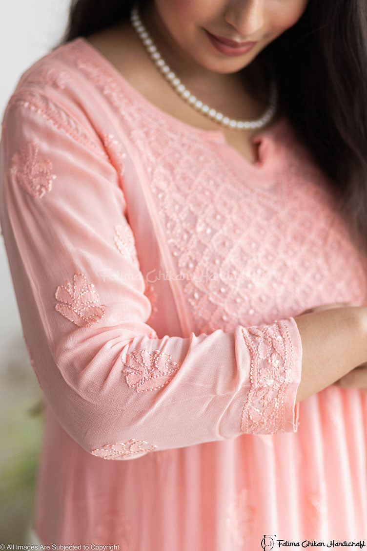 PEACH IQRA VISCOSE CHIKANKARI PEPLUM TOP