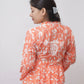 ZAREEN ORANGE MULMUL PRINTED CHIKANKARI GOWN