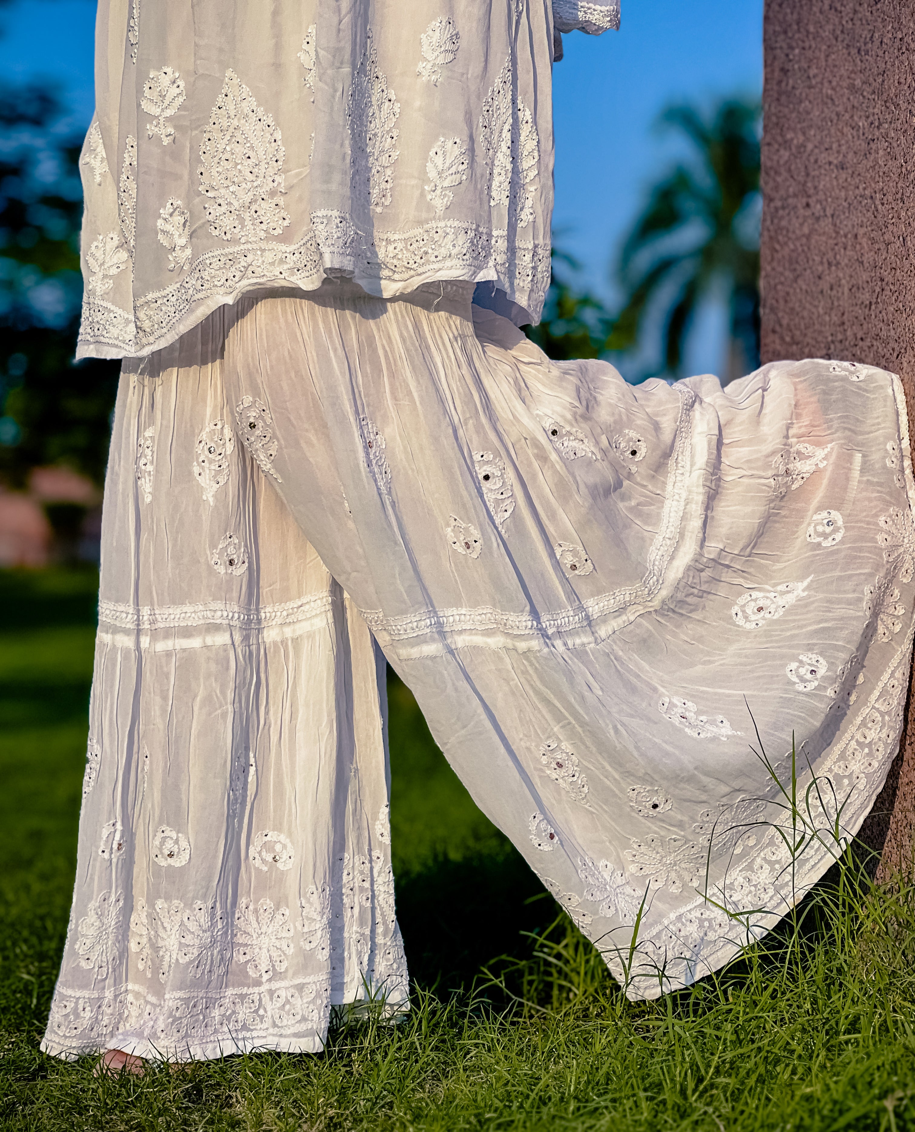 Disha Patil | Ivory Embellished Peplum With Sharara Pants | INDIASPOPUP.COM